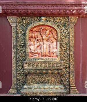 Traditional Khmer style relief on the outside of Wat Phnom, the city temple of Phnom Penh in Cambodia. Stock Photo