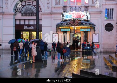 LONDON, UK - APRIL 22, 2016: People walk by Criterion Theatre in West End, London, UK. West End theatres sold 14.4 million tickets in 2013. Stock Photo