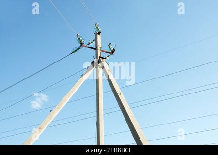 corner transmission tower of high voltage overhead power line. strain glass insulators, consists of assembly of suspension insulators, suspension stri Stock Photo