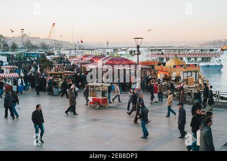 Istanbul, Turkey - January 3 2012: Restaurant Boats on the Golden Horn Selling Grilled Mackerel Fish Sandwiches called 'Tarihi Eminonu Balik Ekmek' ne Stock Photo