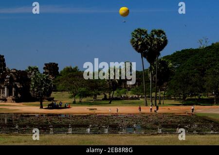 Near Angkor Wat with yellow Hot Air Balloon Experience in Siem Reap Cambodia, Asia Stock Photo