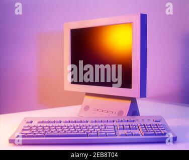 2000 HISTORICAL PERSONAL COMPUTER FLAT MONITOR SCREEN (©2000 SONY CORP) KEYBOARD (©2000 APPLE INC) Stock Photo