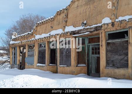 The front of an abandoned building that was once a ballroom in Tierra Amarilla, New Mexico. Stock Photo