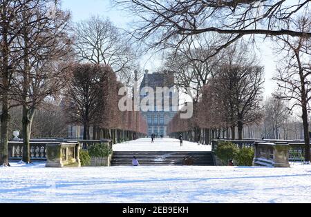 Paris, France - February 11th 2021: Paris under the snow at the Tuileries garden. Stock Photo