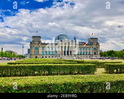 Beautiful facade of Reichstag in the park captured in Berlin, Germany Stock Photo