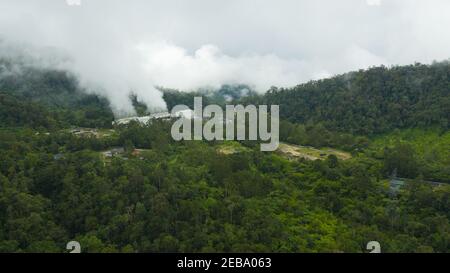 Geotermal power plant on Mount Apo. Steam and pipework at the Geothermal Power Station. Mindanao, Philippines. Stock Photo