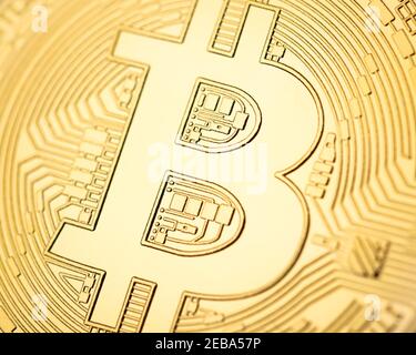 Macro shot of physical cryptocurrency Bitcoin, golden coin Stock Photo