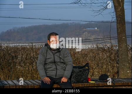 Paju, South Korea. 12th Feb, 2021. Hyeon Seong-taek, who was born in North Korea but came to the South alone in 1951 sits near the DMZ at Imjingak Park in Paju, South Korea on February 12, 2021. He made an offering on Lunar New Year for his family members back in North Korea. Photo by Thomas Maresca/UPI Credit: UPI/Alamy Live News Stock Photo