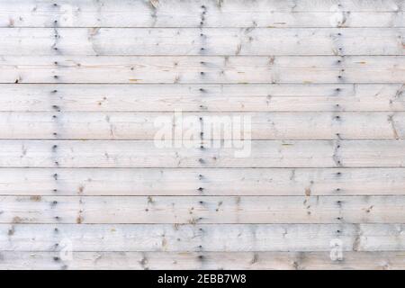 Vintage weathered white painted wooden background. Background texture of old wooden boards wall. Ancient wooden texture. Faded white paint retro patte Stock Photo