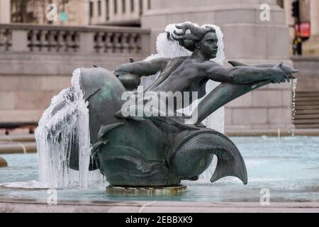 London, UK.  12 February 2021. UK Weather:  An ice covered frozen fountain in Trafalgar Square as the cold weather brought on by Storm Darcy continues.   Credit: Stephen Chung / Alamy Live News Stock Photo