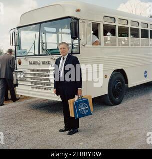 Inspection tour of NASA installations: Cape Canaveral Florida, 2:31PM. Assistant Physician to President John F. Kennedy, Rear Admiral Dr. George G. Burkley, stands beside a bus, during President Kennedyu0027s visit to Cape Canaveral Air Force Station, Cape Canaveral, Florida. The President visited Cape Canaveral as part of a two-day inspection tour of National Aeronautics and Space Administration (NASA) field installations. Stock Photo