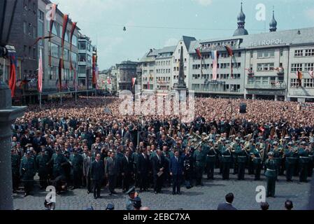 Trip to Europe: Germany, Bonn: City Hall, ceremonies and remarks, 1:25PM. Crowds gather outside Altes Rathaus (Old City Hall) in Bonn, West Germany (Federal Republic), to hear President John F. Kennedy deliver remarks. Stock Photo