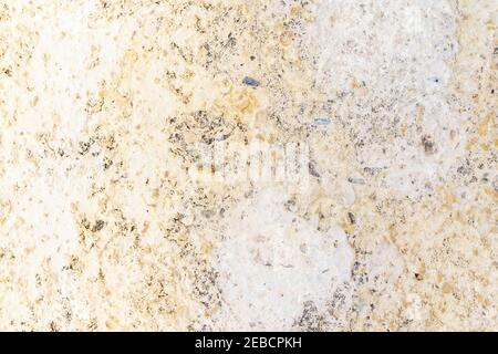 Natural stone granite texture background. Granite texture with spots texture. Closeup pattern of beige granite Stock Photo