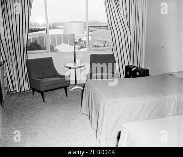 Trip to Bermuda: White House Army Signal Agency (WHASA) communications equipment preparations, personnel, and city views. Interior of an unidentified hotel room in Bermuda during the White House Army Signal Agency (WHASA) set-up of communications equipment for President John F. Kennedyu2019s meeting with Prime Minister Harold Macmillan of Great Britain. [Photograph by Dan Lewis] Stock Photo