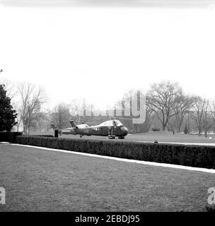 President Kennedy departs White House via helicopter for Andrews Air Force Base, 1:50PM. View of the South Lawn of the White House, Washington, D.C., as Marine One, carrying President John F. Kennedy, prepares to lift off the ground. Bound for Andrews Air Force Base, the President would then fly to Palm Beach, Florida. Stock Photo