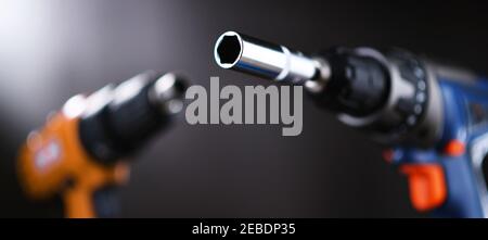 A screw gun and a pistol-grip cordless drill. Stock Photo