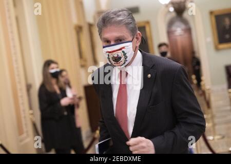 Washington, United States. 12th Feb, 2021. Sen. Joe Manchin, D-W.Va., arrives for the second impeachment trial of former President Donald Trump at the U.S. Capitol in Washington, DC on Friday, February 12, 2021. Pool photo by Chris Kleponis/UPI Credit: UPI/Alamy Live News Stock Photo