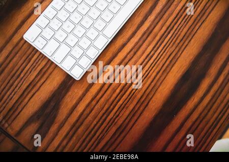 computer keyboard on wooden table Stock Photo
