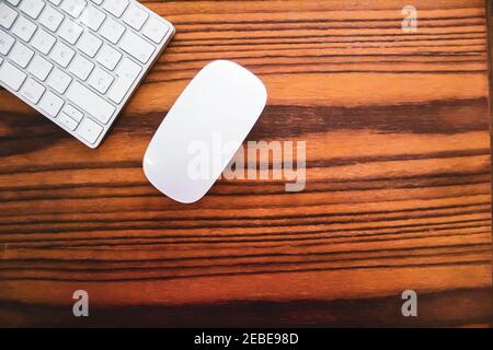 computer keyboard and mouse on wooden table Stock Photo