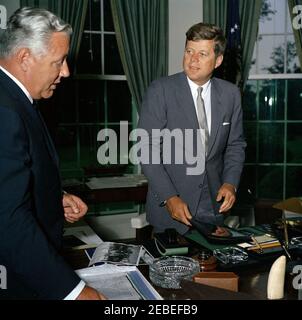 Presentation to President Kennedy of a John Adams letter to President Madison, 12:55PM. President John F. Kennedy speaks to Alphonsus J. Donahue, Jr. (left), in the Oval Office, White House, Washington, D.C. Donahue presented President Kennedy with an original letter written by former President John Adams to President James Madison. Stock Photo