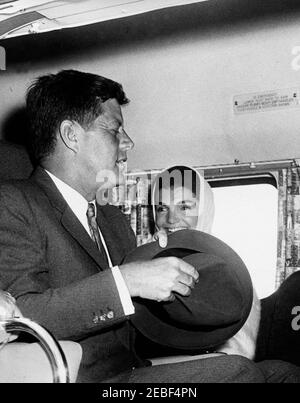 President Kennedy arrives at Andrews Air Force Base from West Palm Beach, Florida, 4:20PM. President John F. Kennedy and First Lady Jacqueline Kennedy aboard helicopter, traveling from Andrews Air Force Base in Maryland to the White House, Washington, D.C., after their return from West Palm Beach, Florida. Stock Photo