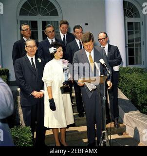 Presentation of the National Teacher of the Year Award to Helen Adams of Cumberland, Wisconsin, 12:45PM. President John F. Kennedy presents the 1961 Teacher of the Year Award (a project of the Council of Chief State School Officers) to Helen Adams of Cumberland, Wisconsin. Superintendent of Public Instruction (Madison, Wisconsin), George E. Watson, stands in front at far left. Back row, L-R: Publisher of LOOK Magazine, Vernon C. Myers; Secretary of Health, Education, and Welfare, Abraham Ribicoff; Commissioner of Education, Dr. Sterling M. McMurrin; Managing Editor of LOOK Magazine, William B. Stock Photo