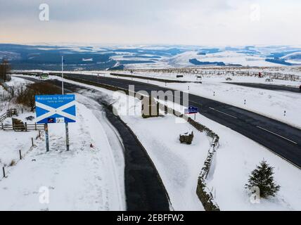 View looking north of A68 trunk road crossing the England-Scotland border from Northumberland to the Scottish Borders region at the Carter Bar. Stock Photo