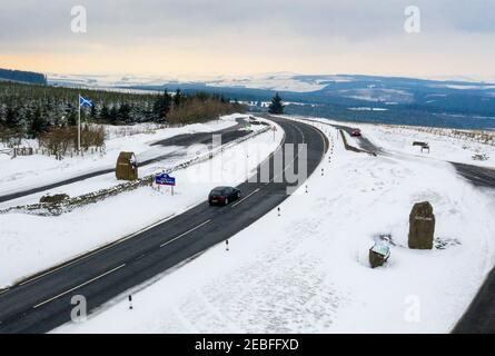 View looking north of A68 trunk road crossing the England-Scotland border from Northumberland to the Scottish Borders region at the Carter Bar. Stock Photo