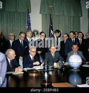 Meeting with members of the Presidentu2019s Committee on Equal Employment Opportunity, 9:30AM. President John F. Kennedy and Vice President Lyndon B. Johnson attend a meeting of the Presidentu2019s Committee on Equal Employment Opportunity in the Cabinet Room, White House, Washington, D.C. (L-R) Seated: Secretary of Commerce Luther Hodges; Secretary of Labor Arthur Goldberg; President Kennedy; Vice President Johnson. Those standing include president of the American Federation of Labor and Congress of Industrial Organizations (AFL-CIO) George Meany; Chairman of Kaiser Steel Corporation Edgar Stock Photo