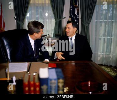 Meeting with Andrei A. Gromyko, Minister of Foreign Affairs of the Soviet Union (USSR), 11:59AM. President John F. Kennedy meets with Minister of Foreign Affairs of the Soviet Union Andrei Gromyko in the Oval Office, White House, Washington, D.C. Stock Photo