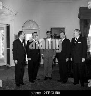 Senate President Pro Tempore John F. Kennedy speaks with colleagues on ...