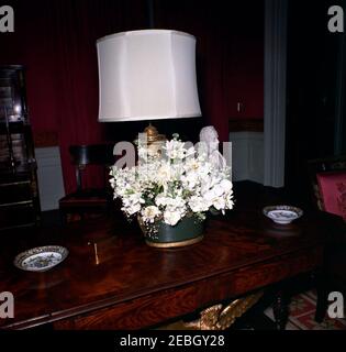 Dinner in honor of Nobel Prize Winners, 8:00PM. View of a flower arrangement in the Red Room of the White House, Washington, D.C., set up for a dinner in honor of Nobel Prize winners from the Western Hemisphere. Stock Photo