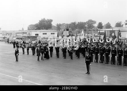 Arrival ceremony for Archbishop Makarios III, President of Cyprus, 11:00AM. President John F. Kennedy and President of the Republic of Cyprus, Archbishop Makarios III (both walking at left), review honor guard troops during arrival ceremonies for Archbishop Makarios III; Commander of Troops, Lieutenant Colonel Charles P. Murray, Jr., escorts the President and Archbishop. Military Air Transport Service (MATS) terminal, Washington National Airport, Washington, D.C. Stock Photo