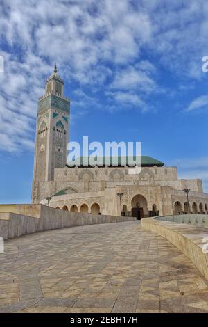 Casablanca, Morocco - March 2, 2020 : The Hassan 2 mosque from a distance next to the ocean in Casablanca Morocco Stock Photo