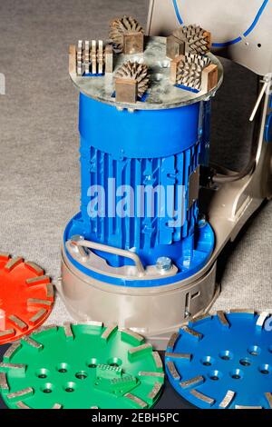 Single disc trowel grinder for convenient, fast processing of various floor surfaces in professional conditions. Stock Photo