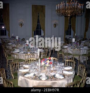 Dinner in honor of Andru00e9 Malraux, Minister of State for Cultural Affairs of France, 8:00PM. View of tables set for a dinner in honor of Minister of State for Cultural Affairs of France, Andru00e9 Malraux. State Dining Room, White House, Washington, D.C. Stock Photo