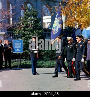 https://l450v.alamy.com/450v/2ebhja5/veterans-day-ceremonies-at-arlington-national-cemetery-1100am-president-john-f-kennedy-and-others-walk-to-the-tomb-of-the-unknown-soldier-at-arlington-national-cemetery-in-arlington-virginia-during-veterans-day-ceremonies-walking-with-president-kennedy-commandant-of-the-united-states-marine-corps-general-david-m-shoup-commanding-general-of-the-military-district-of-washington-major-general-philip-c-wehle-air-force-aide-to-the-president-brigadier-general-godfrey-t-mchugh-white-house-secret-service-agent-stu-stout-stands-third-from-left-in-background-2ebhja5.jpg