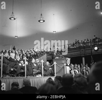 Conservation Tour of Western States: Utah, Salt Lake City: Address at Mormon Tabernacle, 8:18PM. President John F. Kennedy (at lectern) delivers an address at the Mormon Tabernacle in Salt Lake City, Utah. Those seated on platform include: Secretary of the Interior, Stewart L. Udall; President of the Church of Jesus Christ of Latter-Day-Saints, David O. McKay; Senator Frank Moss of Utah; Democratic National Committeeman from Utah, Calvin W. Rawlings. Stock Photo