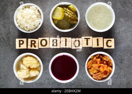 Natural probiotics for healthy bowel. Probiotic as sauerkraut, pickled cauliflower, pickled cucumber, sauerkraut juice, kimchi, beetroot leaven. Stock Photo
