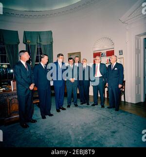 Visit of recipients of the 1962 Rockefeller Public Service Awards, 10:20AM. President John F. Kennedy visits with the recipients of the 1962 Rockefeller Public Service Awards. Listed in the Presidentu2019s schedule: President of the Federal National Mortgage Association, J. Stanley Baughman; assistant general counsel for the Department of Health, Education, and Welfare (HEW), Reginald G. Conley; National Aeronautics and Space Administration (NASA) Deputy Administrator, Hugh L. Dryden; Associate Director for Research and Development for the Census Bureau, Morris H. Hansen; Ambassador at Large, Stock Photo