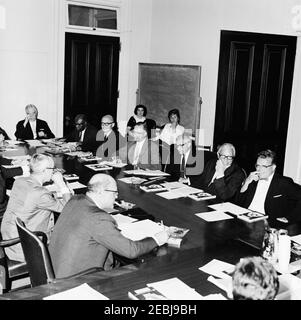 Meeting of the Presidentu0027s Commission on Equal Opportunity in Housing, Executive Office Building (EOB). Members of the Presidentu2019s Committee on Equal Opportunity in Housing meet in the Executive Office Building. Administrator for the Veterans Administration, General John S. Gleason, sits at far left. Washington D.C. Stock Photo