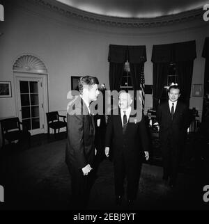 Meeting with Anastas Ivanovich Mikoyan, First Deputy Chairman of the Council of Ministers of the Soviet Union (USSR), 4:30PM. President John F. Kennedy meets with First Deputy Chairman of the Council of Ministers of the Soviet Union, Anastas Mikoyan (center right). Oval Office, White House, Washington, D.C. Stock Photo