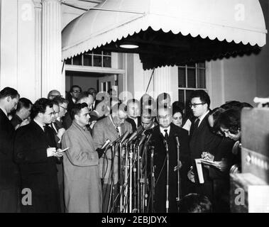 Meeting with Anastas Ivanovich Mikoyan, First Deputy Chairman of the Council of Ministers of the Soviet Union (USSR), 4:30PM. First Deputy Chairman of the Council of Ministers of the Soviet Union, Anastas Mikoyan (center right), speaks with members of the press following a meeting with President John F. Kennedy. White House correspondent for United Press International (UPI), Helen Thomas, stands behind Mr. Mikoyan. West Wing Entrance, White House, Washington, D.C. Stock Photo