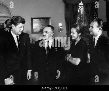 Meeting with Anastas Ivanovich Mikoyan, First Deputy Chairman of the Council of Ministers of the Soviet Union (USSR), 4:30PM. President John F. Kennedy meets with First Deputy Chairman of the Council of Ministers of the Soviet Union, Anastas Mikoyan (center right). U.S. State Department interpreter, Natalie Kushnir, stands second from right. Oval Office, White House, Washington, D.C. Stock Photo