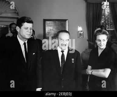 Meeting with Anastas Ivanovich Mikoyan, First Deputy Chairman of the Council of Ministers of the Soviet Union (USSR), 4:30PM. President John F. Kennedy meets with First Deputy Chairman of the Council of Ministers of the Soviet Union, Anastas Mikoyan (center). Also pictured: U.S. State Department interpreter, Natalie Kushnir; United Press International (UPI) photographer, Frank Cancellare (mostly hidden). Oval Office, White House, Washington, D.C. Stock Photo