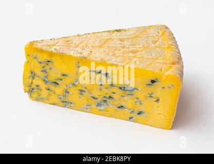 Piece of moldy cheese on a white background Stock Photo