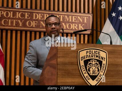 New York, United States. 12th Feb, 2021. Assistant Chief Miguel Iglesias conduct press conference on gun charges arrests with police officers at One Police Plaza. He was joined by (not pictured) Detective Anibal Torres, Captain Rachael Kosak, Detective Kevin McGinn, Police Officer Vincent Gambino. 14 people, including 11 adults and three juveniles were arrested on party bus in downtown Brooklyn with 8 loaded guns and 58 rounds of ammunition inside the bus. (Photo by Lev Radin/Pacific Press) Credit: Pacific Press Media Production Corp./Alamy Live News Stock Photo