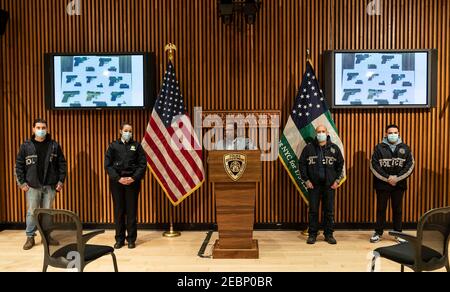 New York, United States. 12th Feb, 2021. Assistant Chief Miguel Iglesias conduct press conference on gun charges arrests with police officers at One Police Plaza. He was joined by (from left) Detective Anibal Torres, Captain Rachael Kosak, Detective Kevin McGinn, Police Officer Vincent Gambino. 14 people, including 11 adults and three juveniles were arrested on party bus in downtown Brooklyn with 8 loaded guns and 58 rounds of ammunition inside the bus. (Photo by Lev Radin/Pacific Press) Credit: Pacific Press Media Production Corp./Alamy Live News Stock Photo