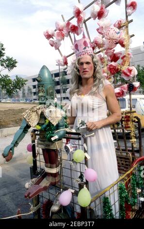 Male participant spoofing the Rose Parade Queen in the Doo Dah Parade in Pasadena, CA Stock Photo