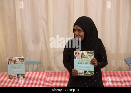 Nadiya Hussain, winner of the BBC series The Great British Bake Off, poses for photos at the Picaddilly branch of Waterstones before a book-signing in Stock Photo